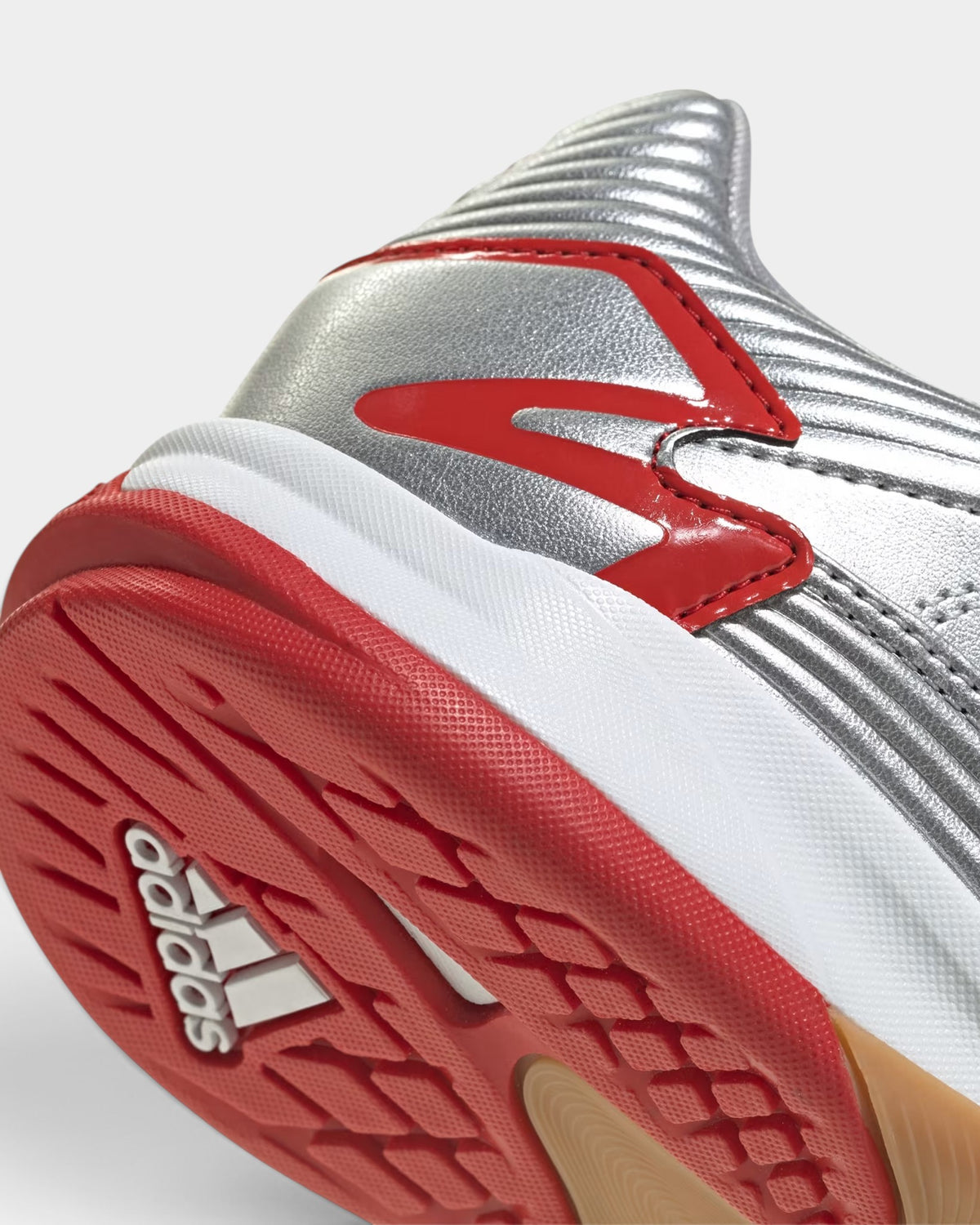 Lockwood Avenue adidas Predator Sala indoor futsal shoe in silver metallic with red accents and rubber grip sole.