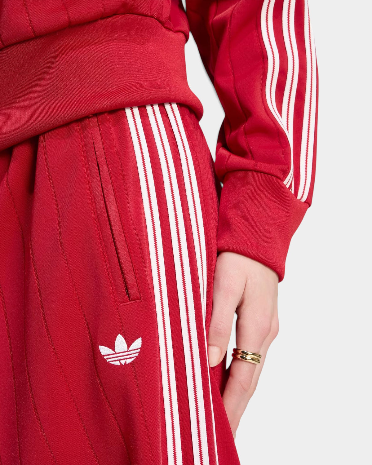 Lockwood Avenue adidas Firebird loose red track pants featuring white 3-Stripes and a Trefoil logo on smooth tricot.