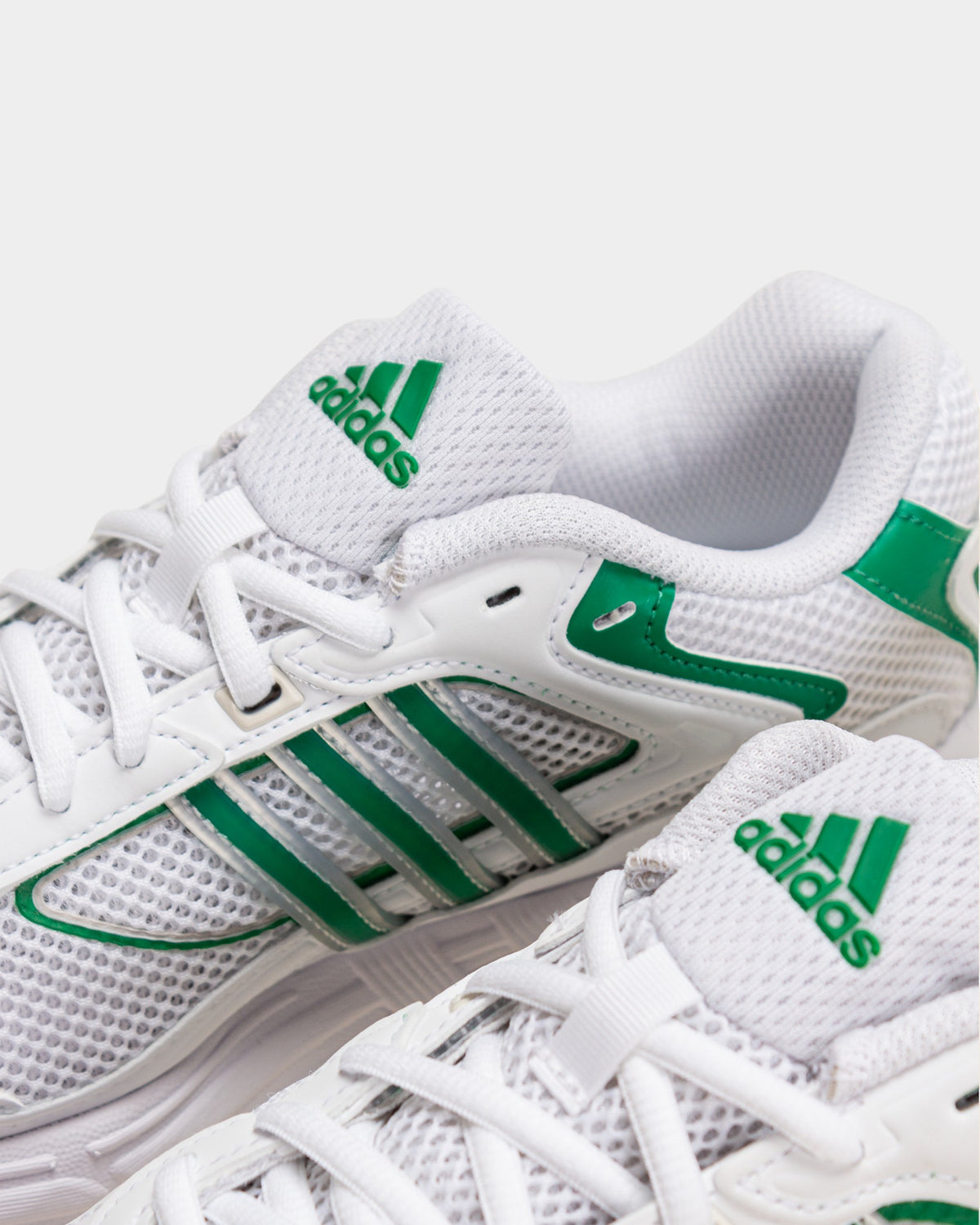 Lockwood Avenue adidas Response CL sneakers in white mesh with green 3-Stripes and logo detail on the tongue