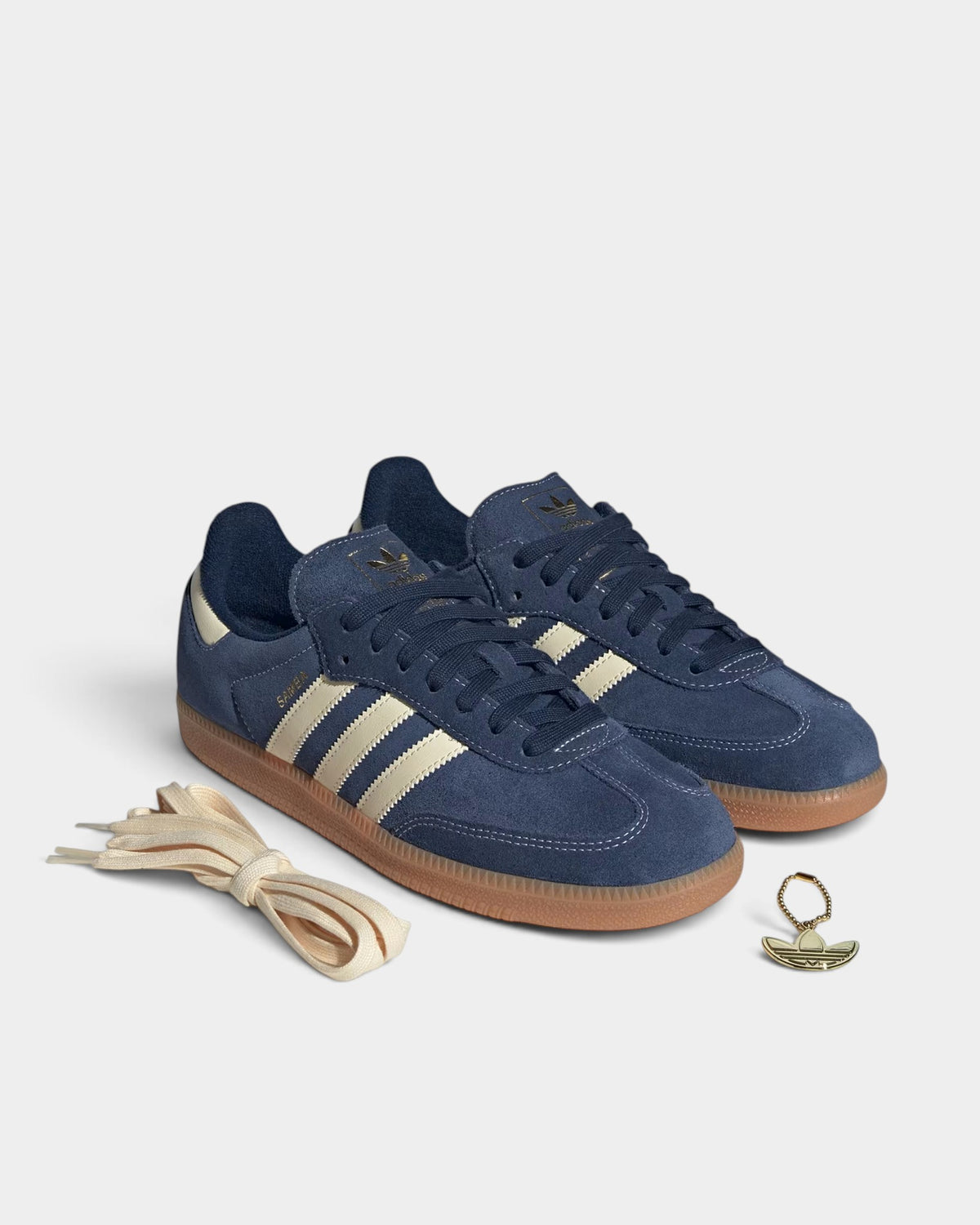 Lockwood Avenue adidas Samba OG sneakers in Night Indigo suede with Warm Vanilla stripes and gum rubber outsoles.