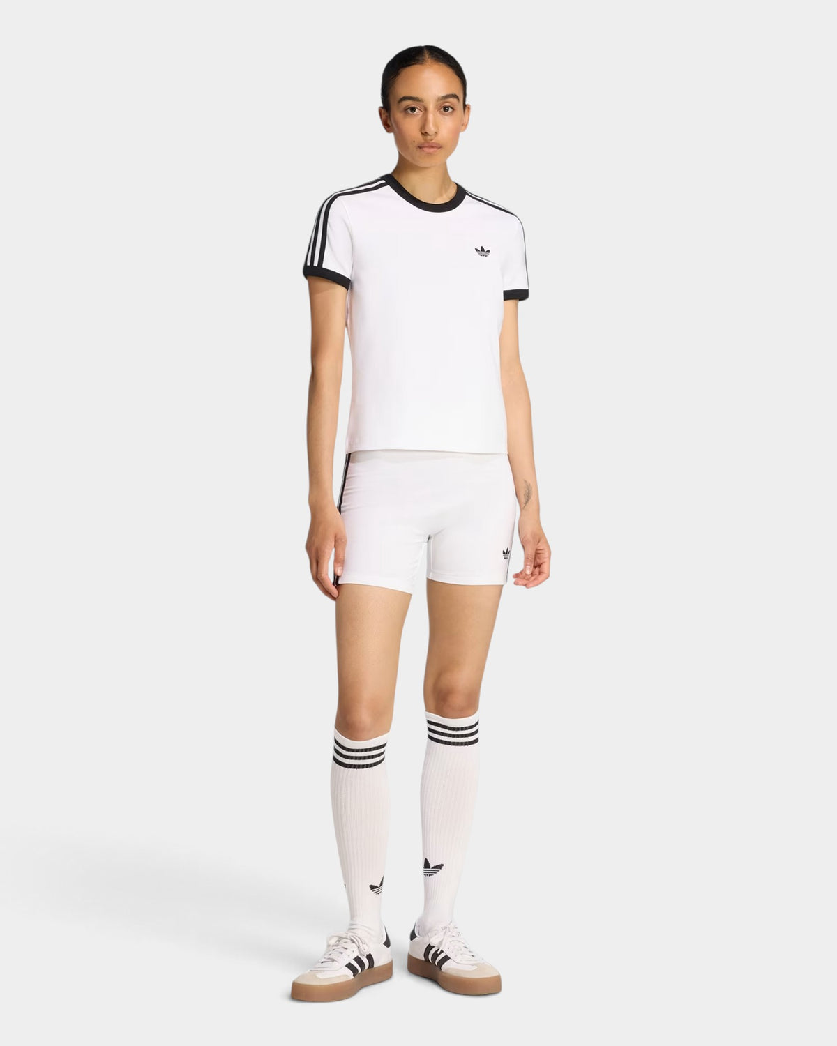 Lockwood Avenue adidas 3-Stripes slim white cotton t-shirt with black trim worn by a model in a sporty outfit