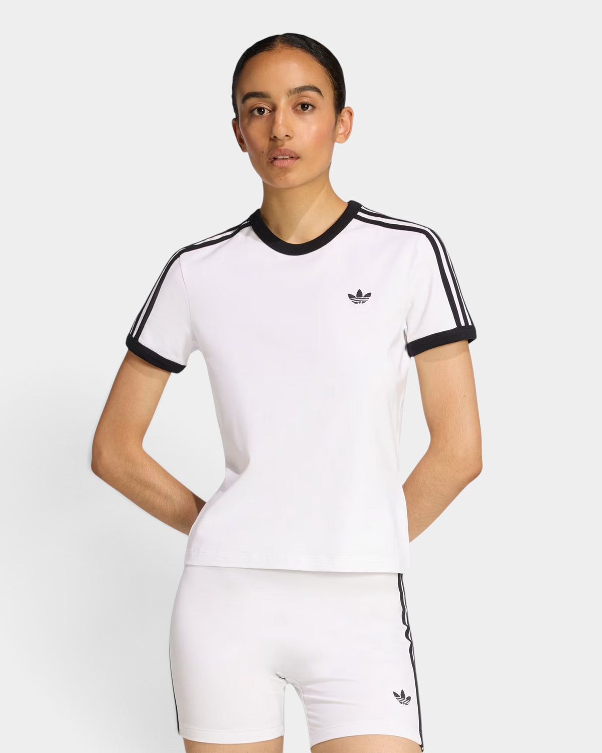 Lockwood Avenue adidas 3-Stripes slim fit white cotton t-shirt with black trim and iconic logo on a model