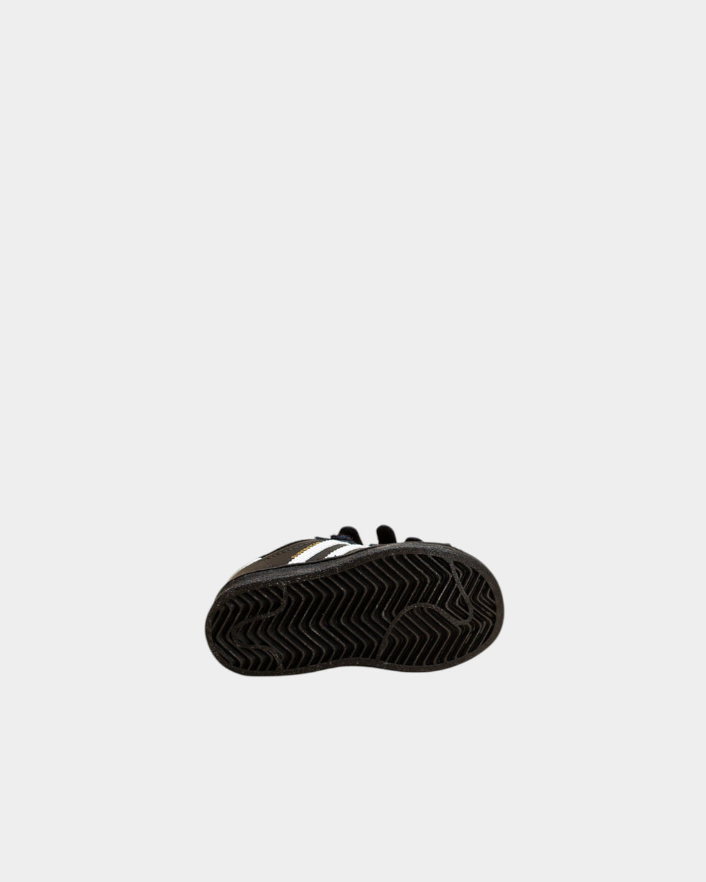 Lockwood Avenue adidas Kids Superstar shoes showing the black rubber herringbone tread pattern on the sole
