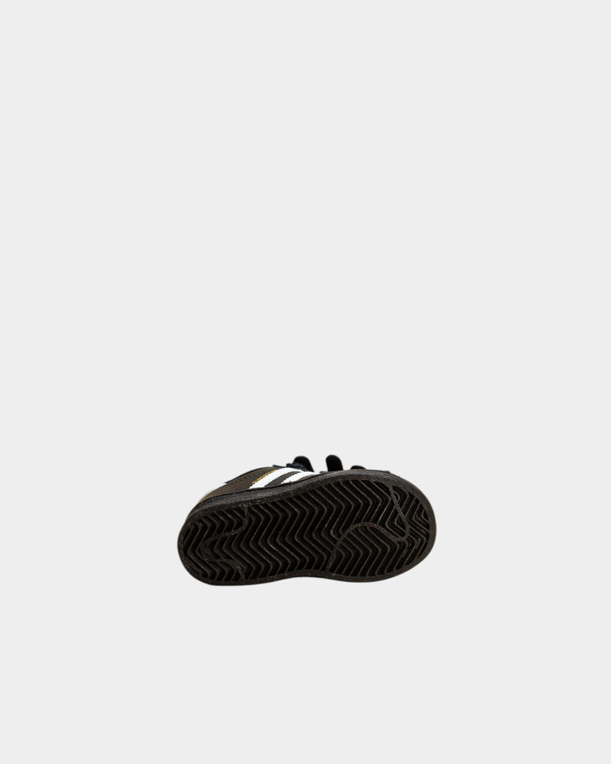 Lockwood Avenue adidas Kids Superstar shoes showing the black rubber herringbone tread pattern on the sole