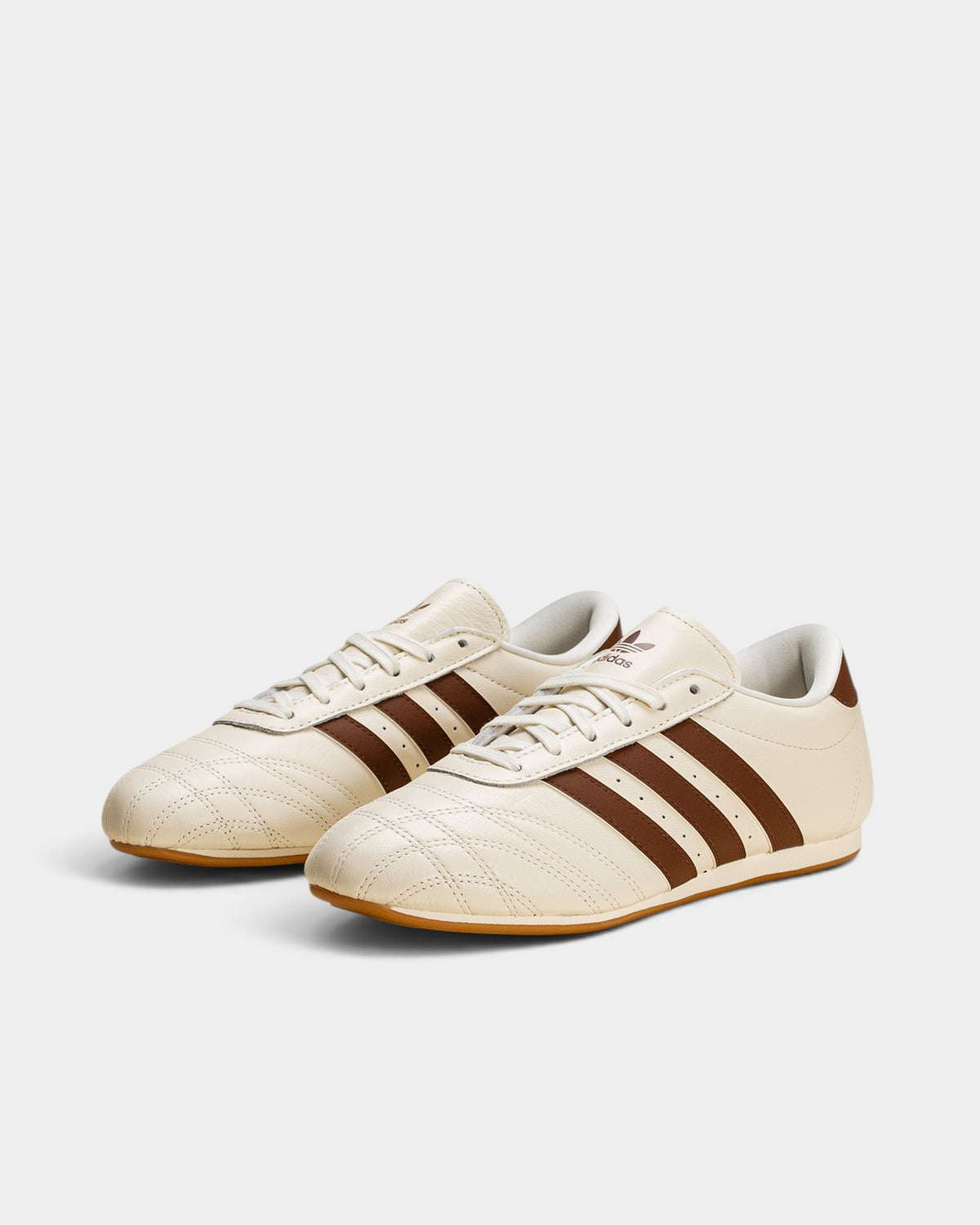 Lockwood Avenue adidas Taekwondo Lace shoes in off-white leather with brown stripes, quilted toe, and gum sole.
