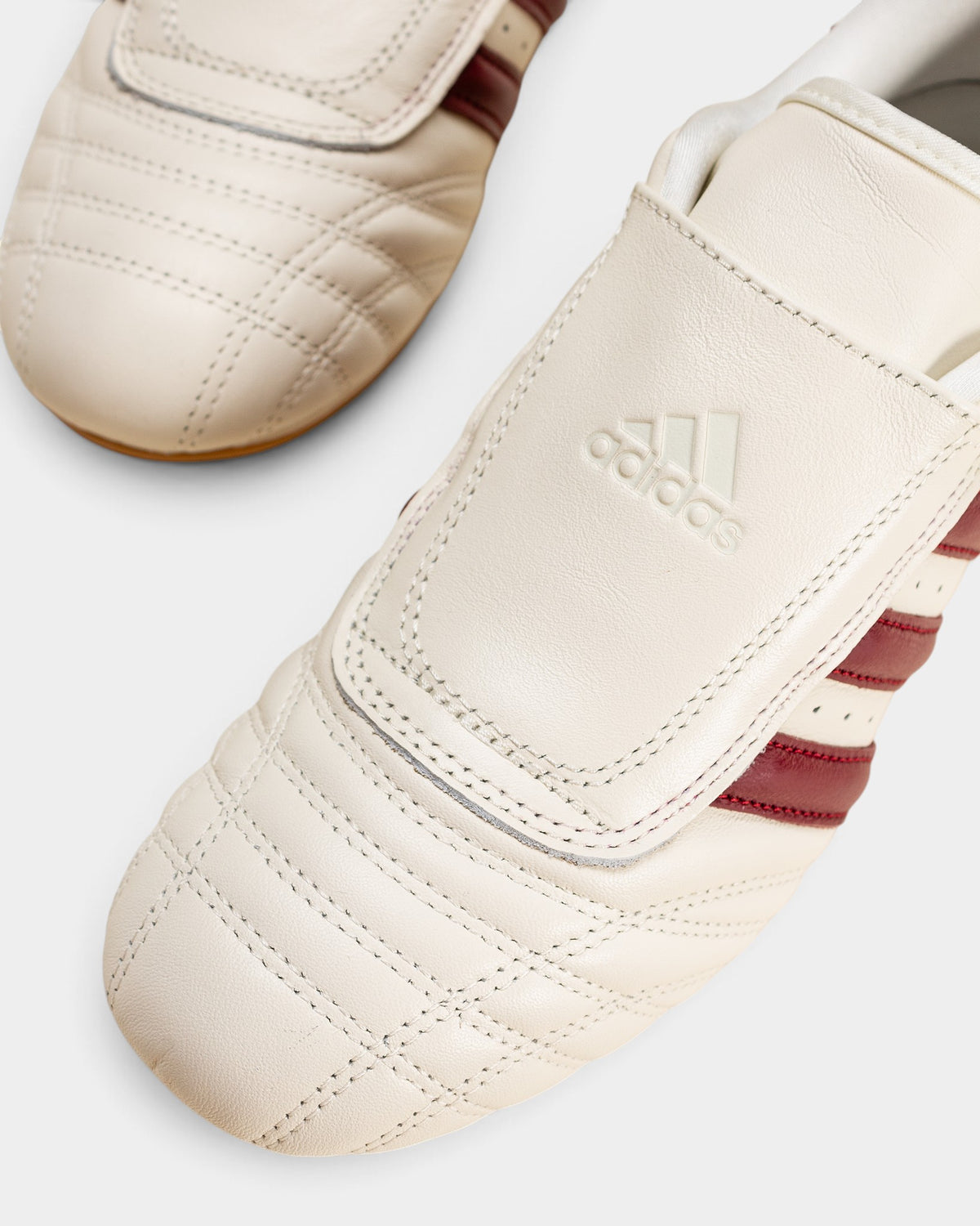 Lockwood Avenue adidas Taekwondo W off-white leather sneakers with maroon stripes and a low-profile gum sole.