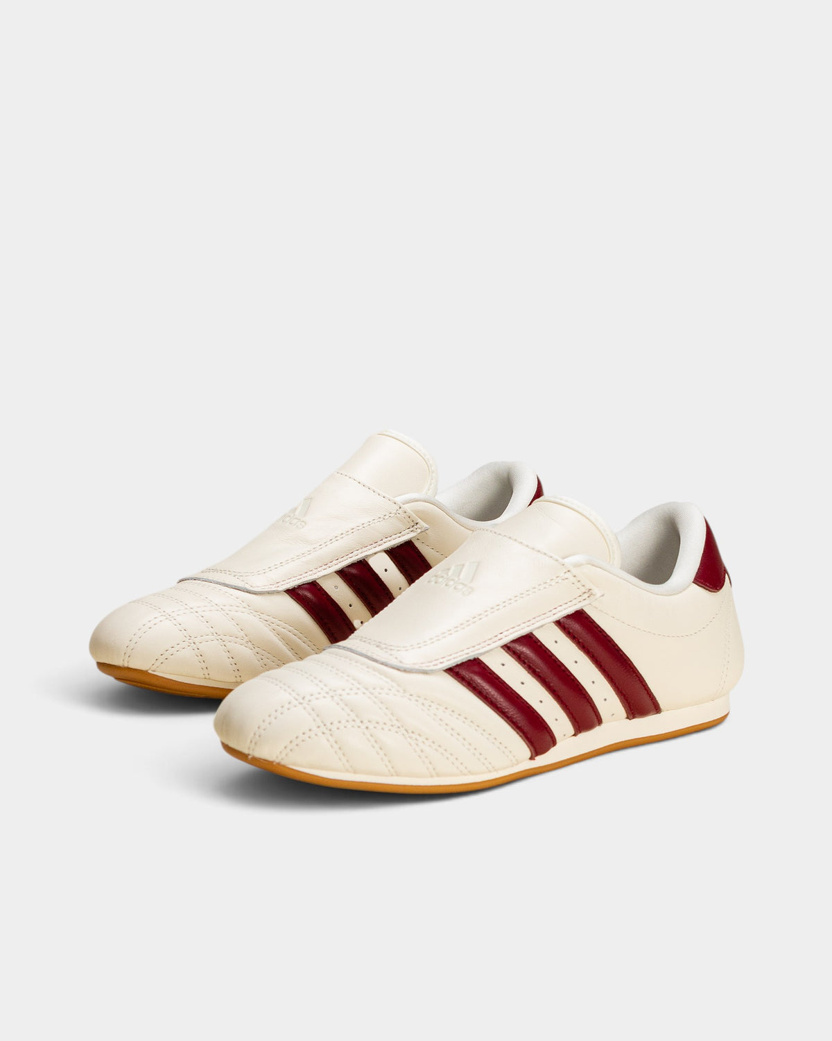 Lockwood Avenue adidas Taekwondo W shoes in off-white leather with maroon stripes and a low-profile gum rubber sole.