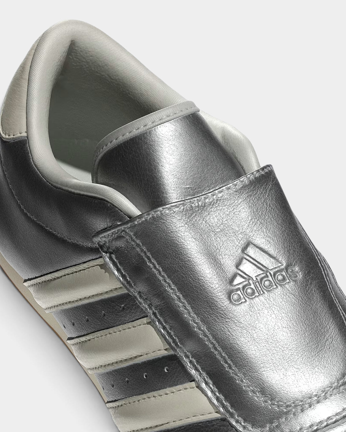Lockwood Avenue adidas Taekwondo metallic silver leather slip-on sneaker with off-white Three Stripes and gum sole
