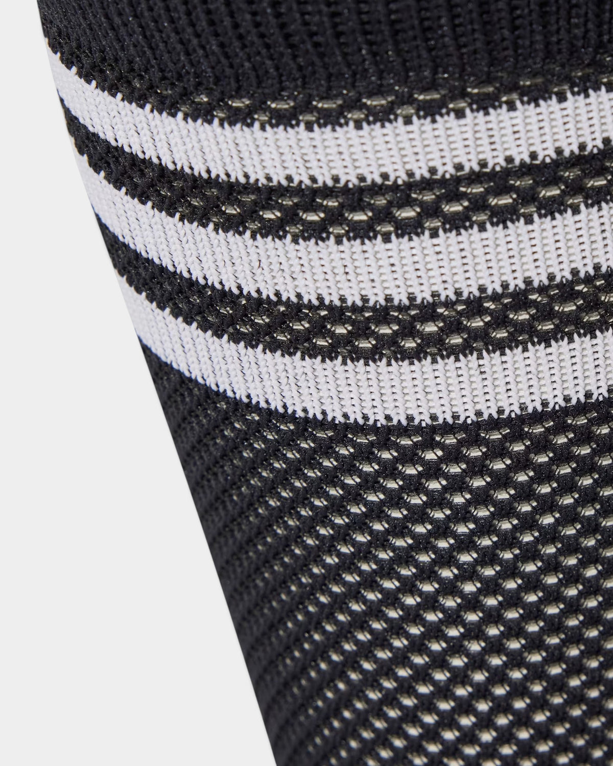 Lockwood Avenue adidas crew socks featuring a black and white textured knit pattern with a ribbed cuff detail