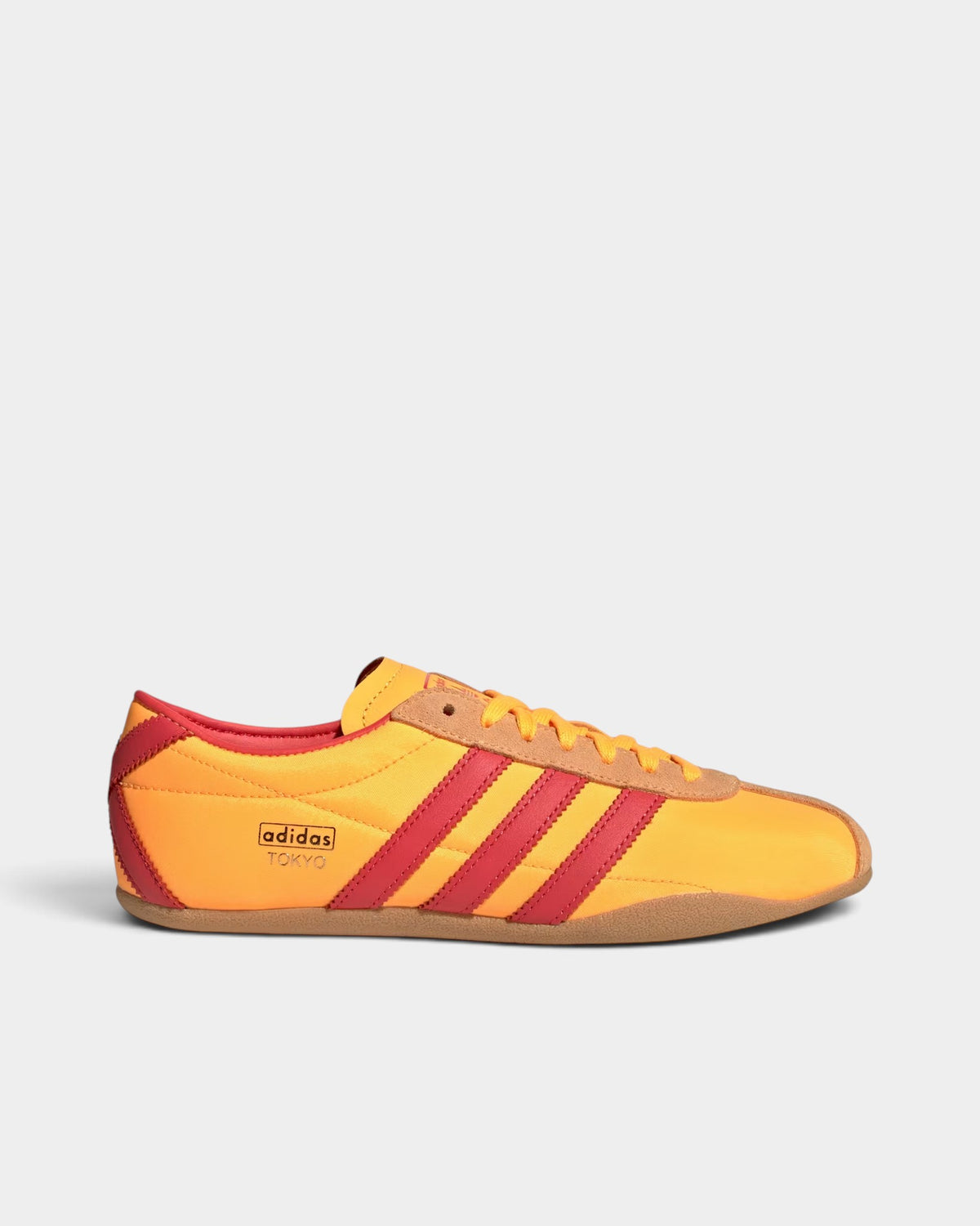 Lockwood Avenue adidas Tokyo retro running shoes in orange, red, and gold with a lightweight nylon upper.