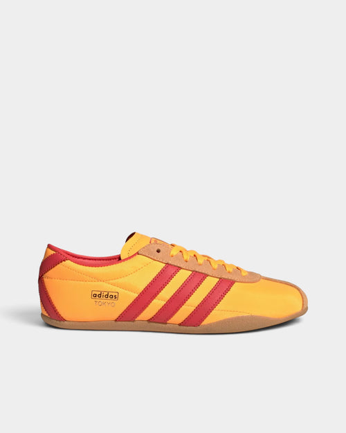 Lockwood Avenue adidas Tokyo retro running shoes in orange, red, and gold with a lightweight nylon upper.