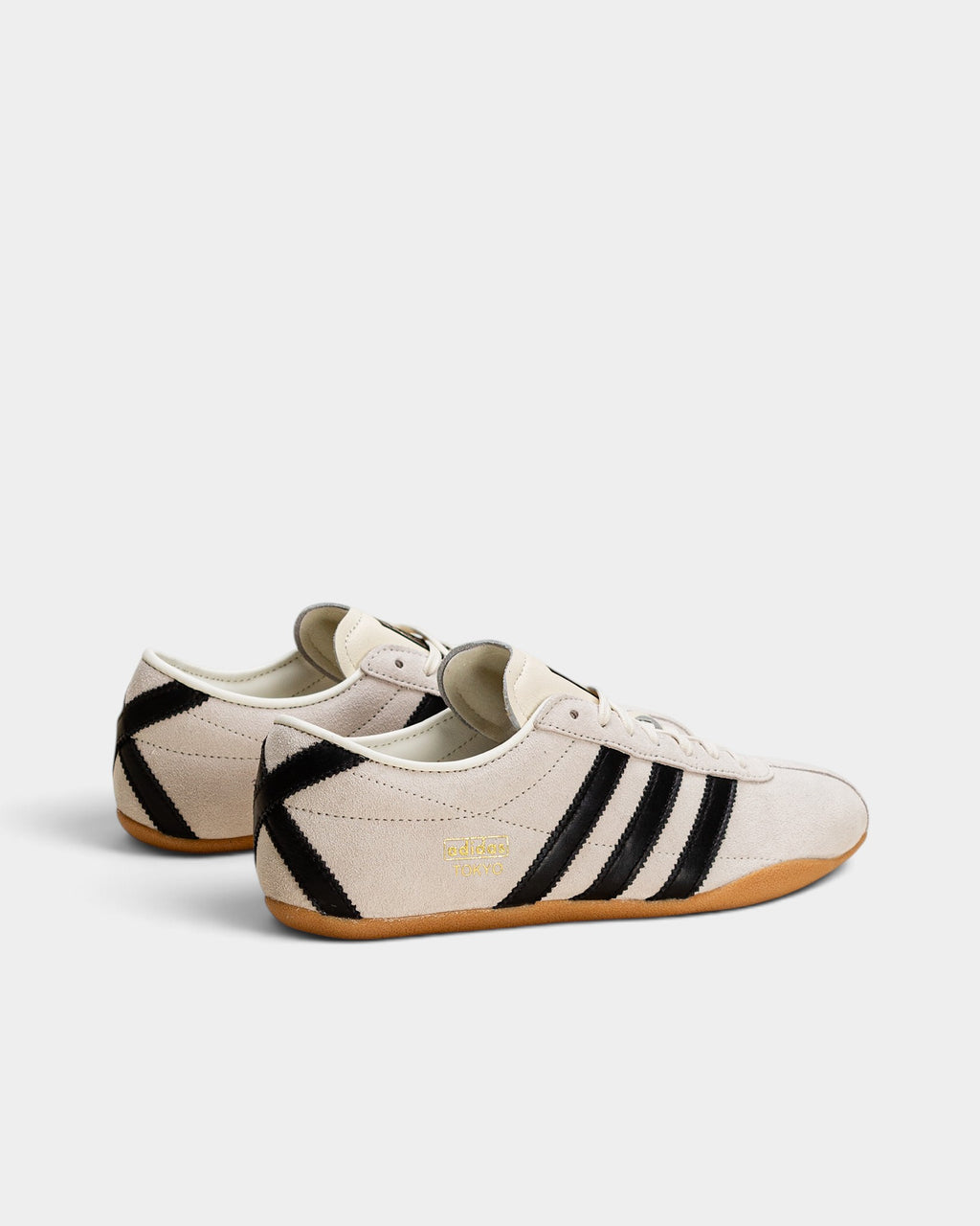 Lockwood Avenue adidas Tokyo W off-white suede sneakers with black stripes and gold foil branding, side view.