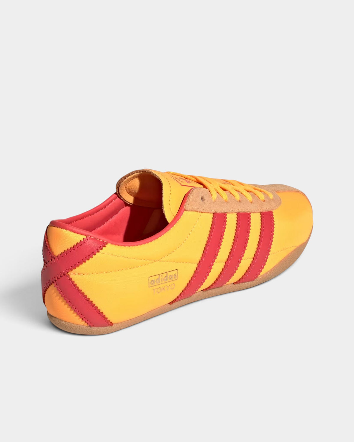 Lockwood Avenue adidas Tokyo retro running shoes in lucid tangerine and red nylon with gold metallic accents