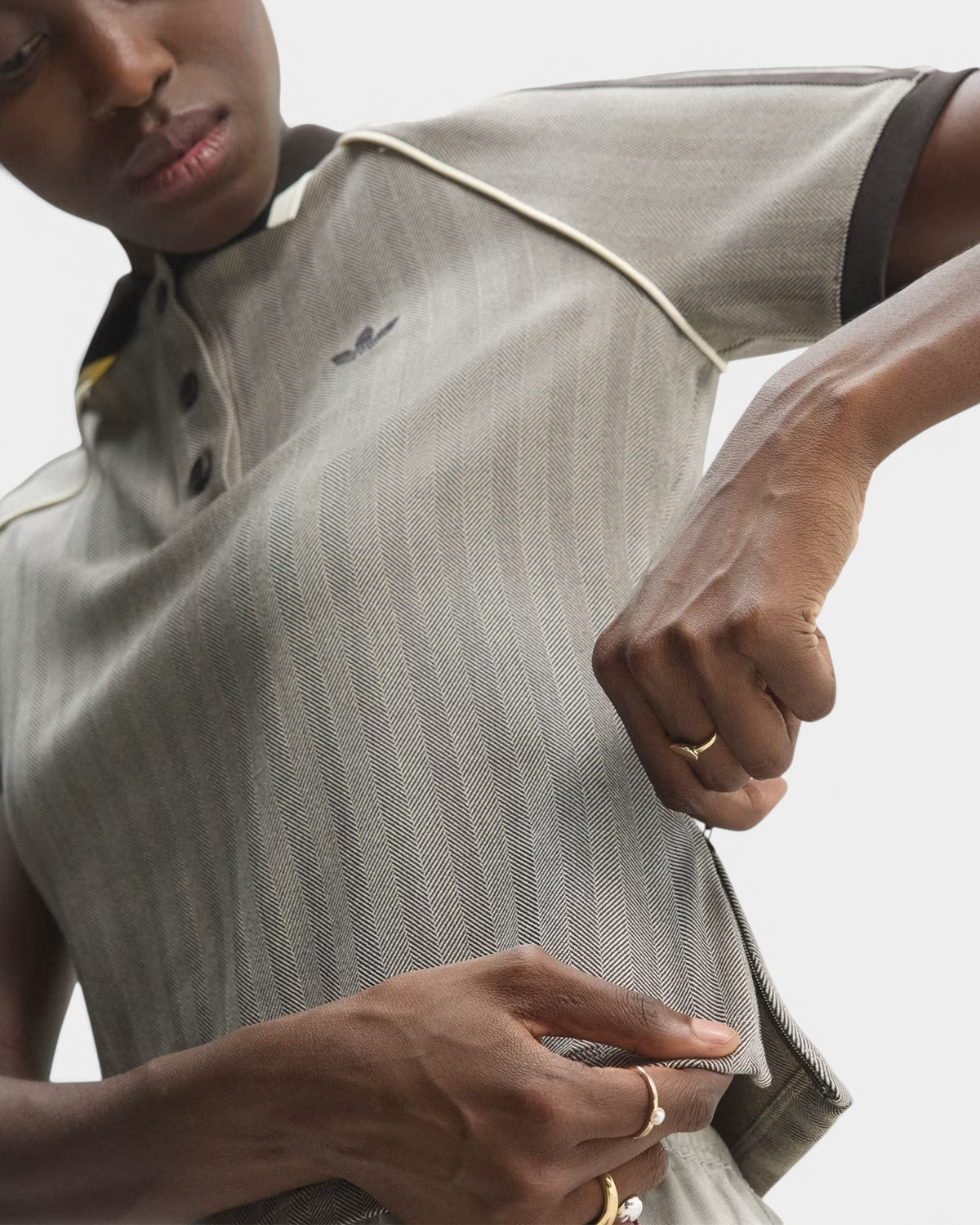Lockwood Avenue adidas tweed polo shirt with a herringbone pattern, slim fit, and contrasting dark collar details.