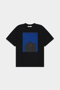 Lockwood Avenue After Midnight heavyweight black streetwear t-shirt with a cinematic blue night building graphic print