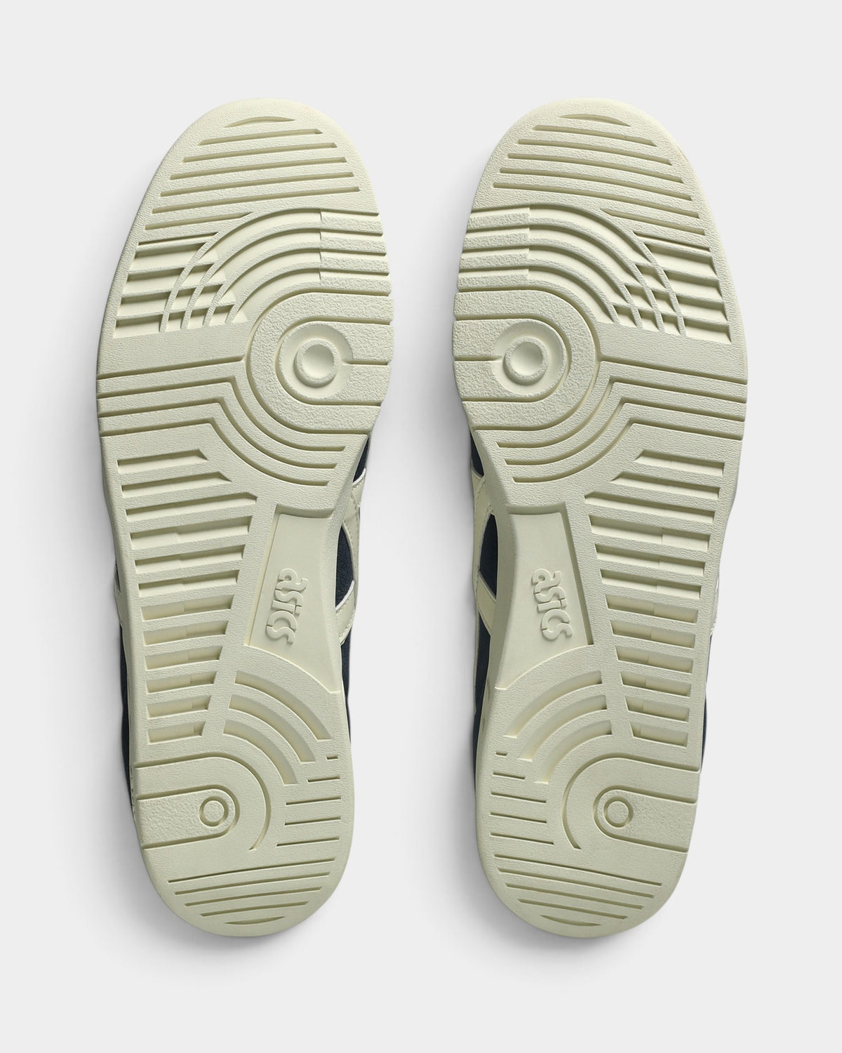 Lockwood Avenue Asics GEL-Vickka Pro skate shoes showing the ivory rubber outsoles with circular traction patterns.