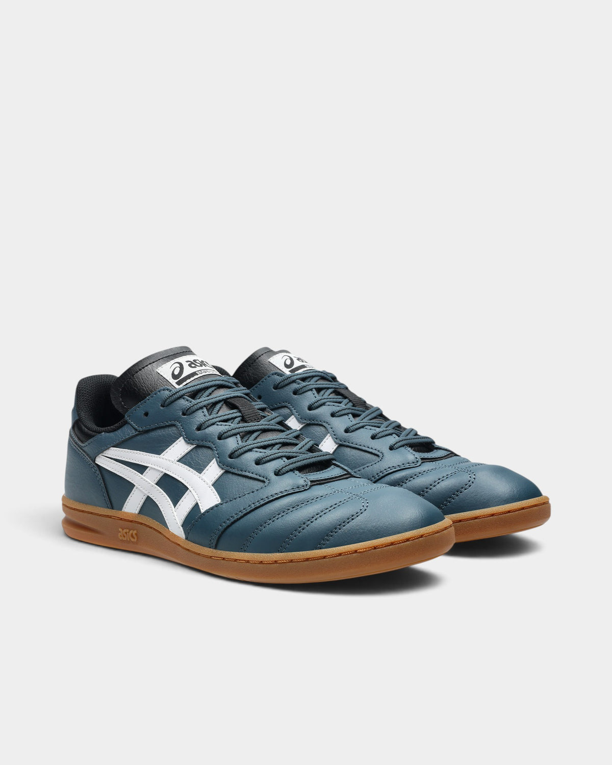 Lockwood Avenue Asics Leggerezza FB skateboarding shoes in blue leather with white stripes and gum rubber soles.