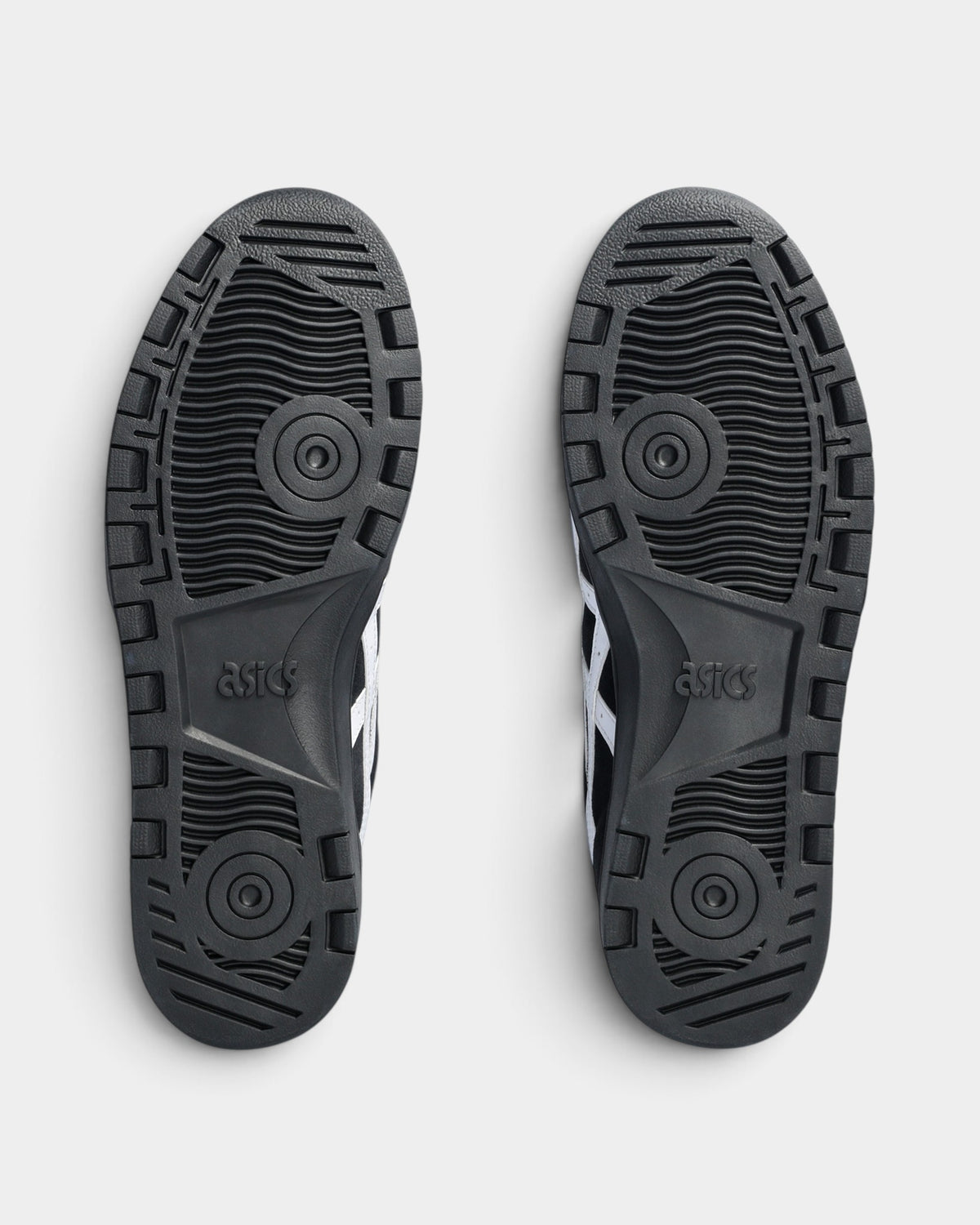 Lockwood Avenue Asics GEL-Vickka Pro skateboarding shoes showing the black rubber outsoles with traction patterns.