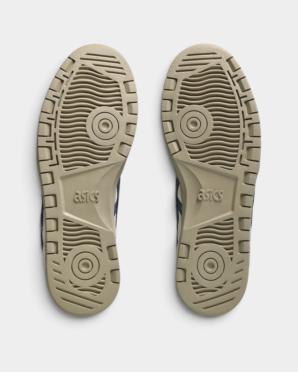 Lockwood Avenue Asics Skateboarding Japan Pro shoes showing the tan rubber outsoles with circular traction patterns.