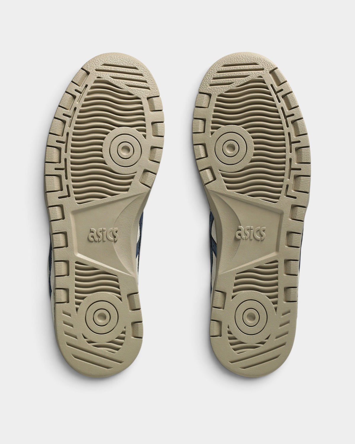 Lockwood Avenue Asics Skateboarding Japan Pro shoes showing the tan rubber outsoles with circular traction patterns.