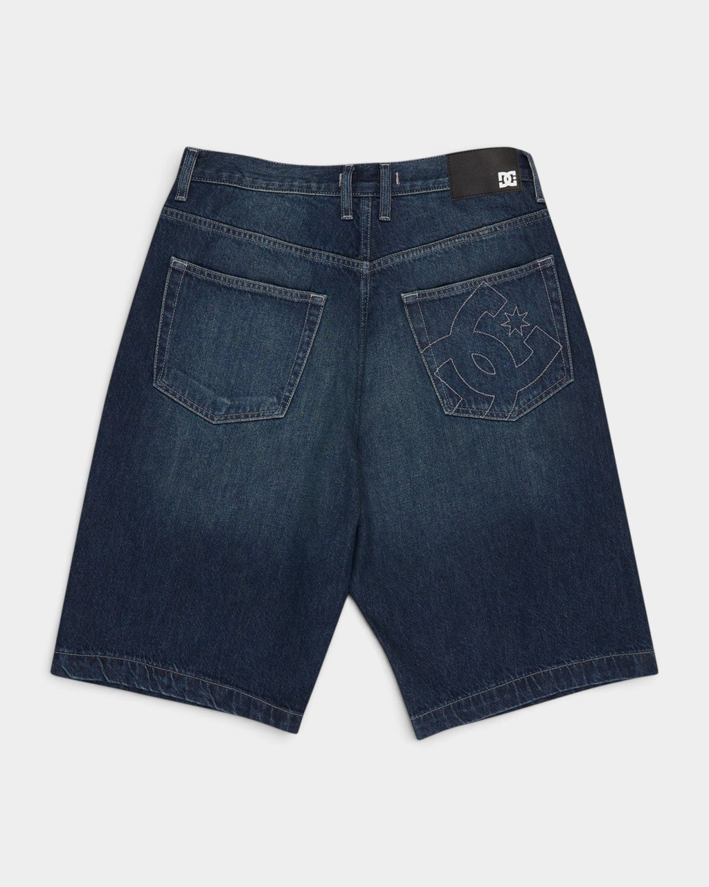 Lockwood Avenue dark denim baggy jorts with embroidered DC logo on back pocket and leather brand patch