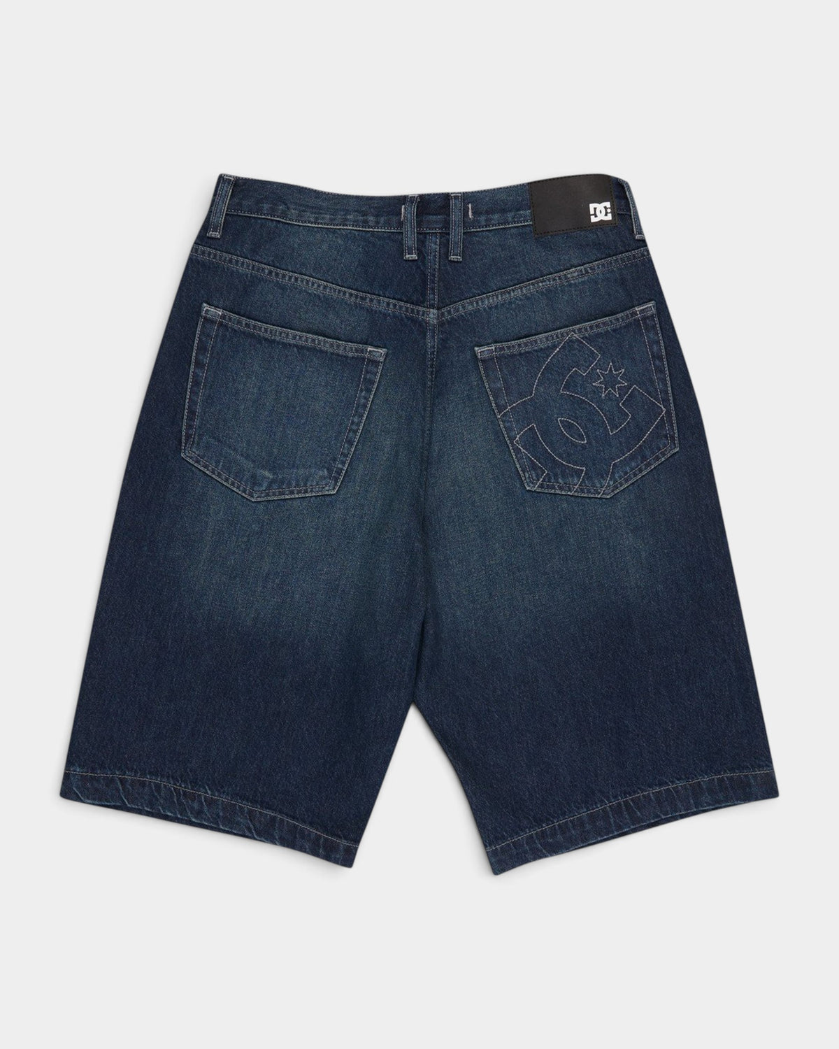 Lockwood Avenue dark denim baggy jorts with embroidered DC logo on back pocket and leather brand patch