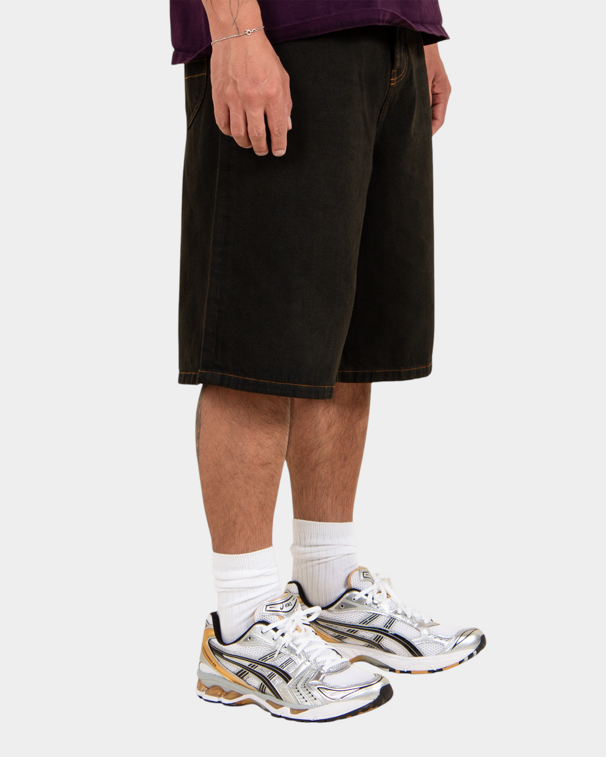 Lockwood Avenue baggy denim shorts in overdye black cotton with angular back pockets and contrast stitching