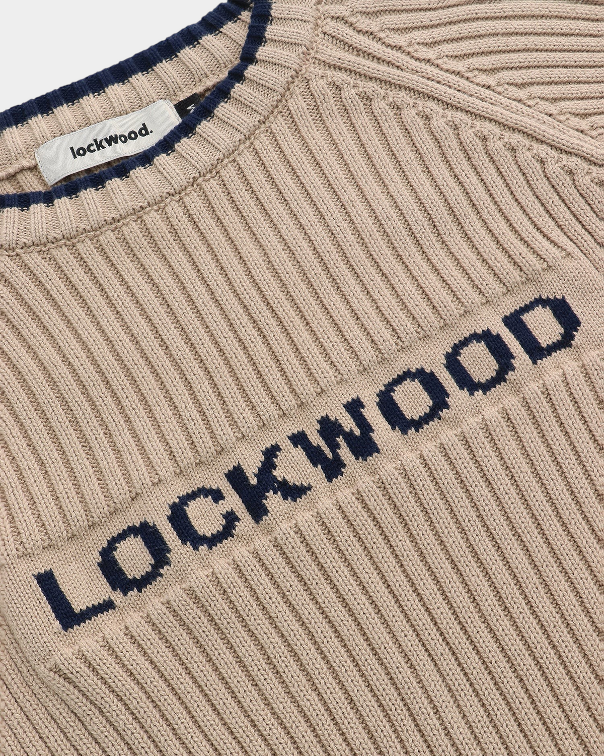 Lockwood Avenue Y2K rib knit cotton sweater in beige with navy blue logo and collar detail