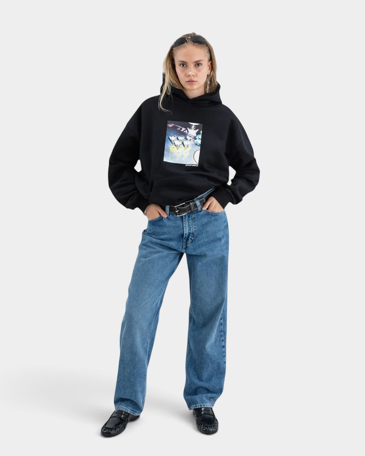 Lockwood Avenue Beyond Medals Ohlympic black heavyweight cotton hoodie with chest trophy print on a female model