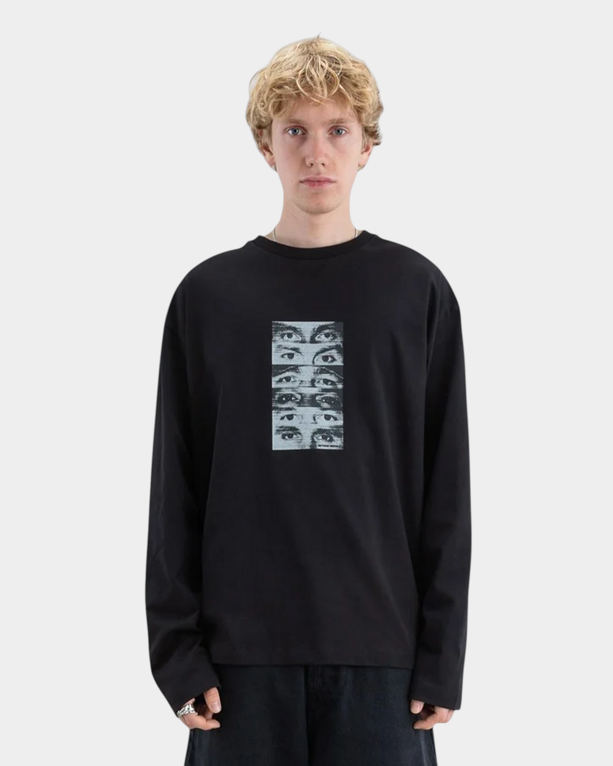 Lockwood Avenue Beyond Medals black long-sleeve cotton t-shirt with a halftone eye graphic print on the chest