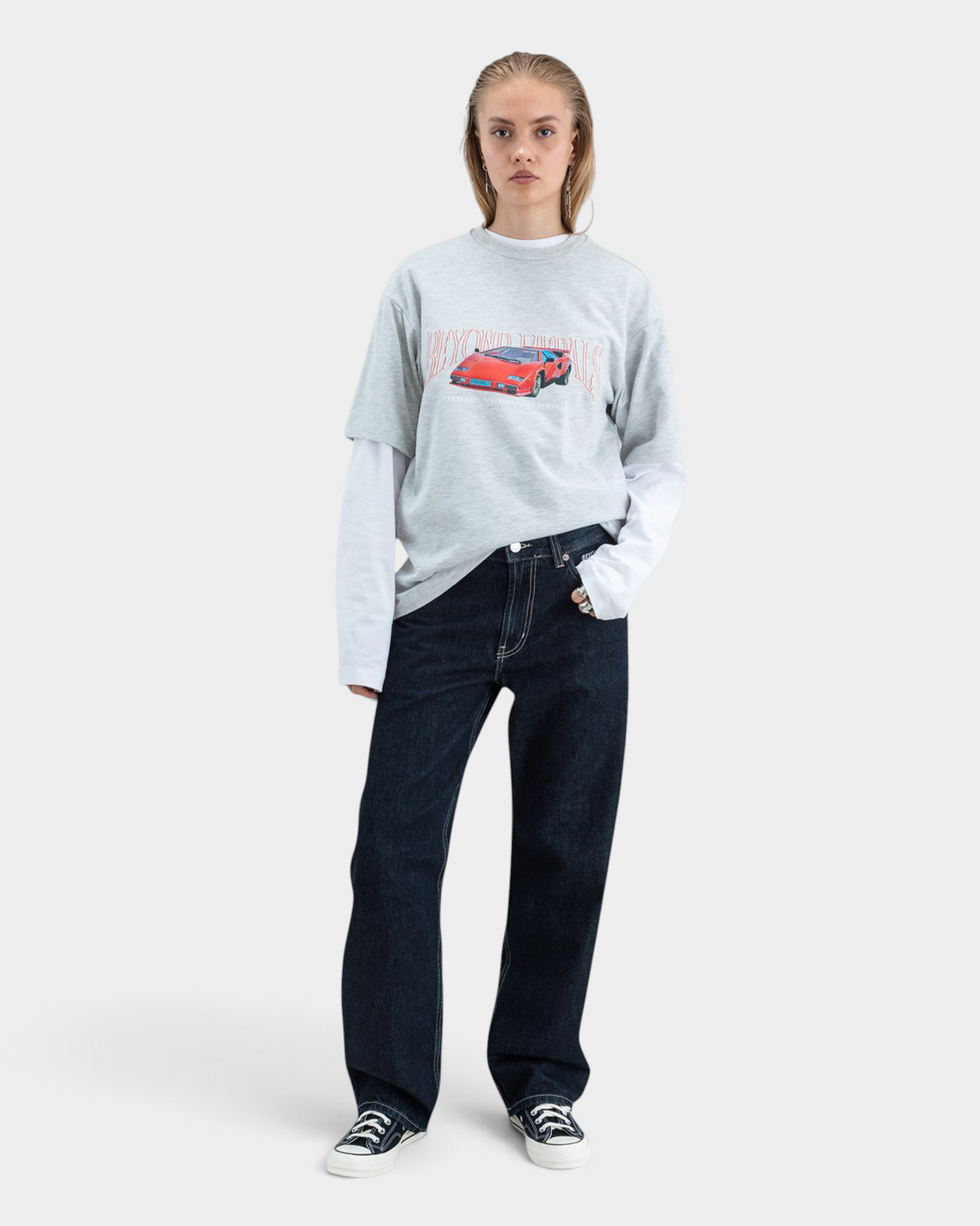 Lockwood Avenue Beyond Medals grey heavy cotton t-shirt featuring a red supercar graphic print on a female model