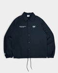 Lockwood Avenue black lightweight polyester snap-front coach jacket with Nowadays Magazine chest branding