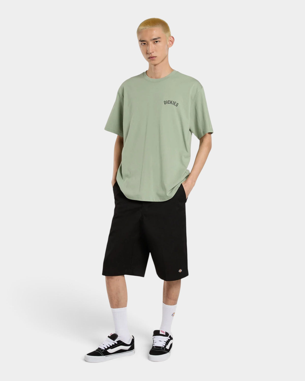 Lockwood Avenue model wearing black Dickies 13 inch loose fit work shorts with a multi-use leg pocket