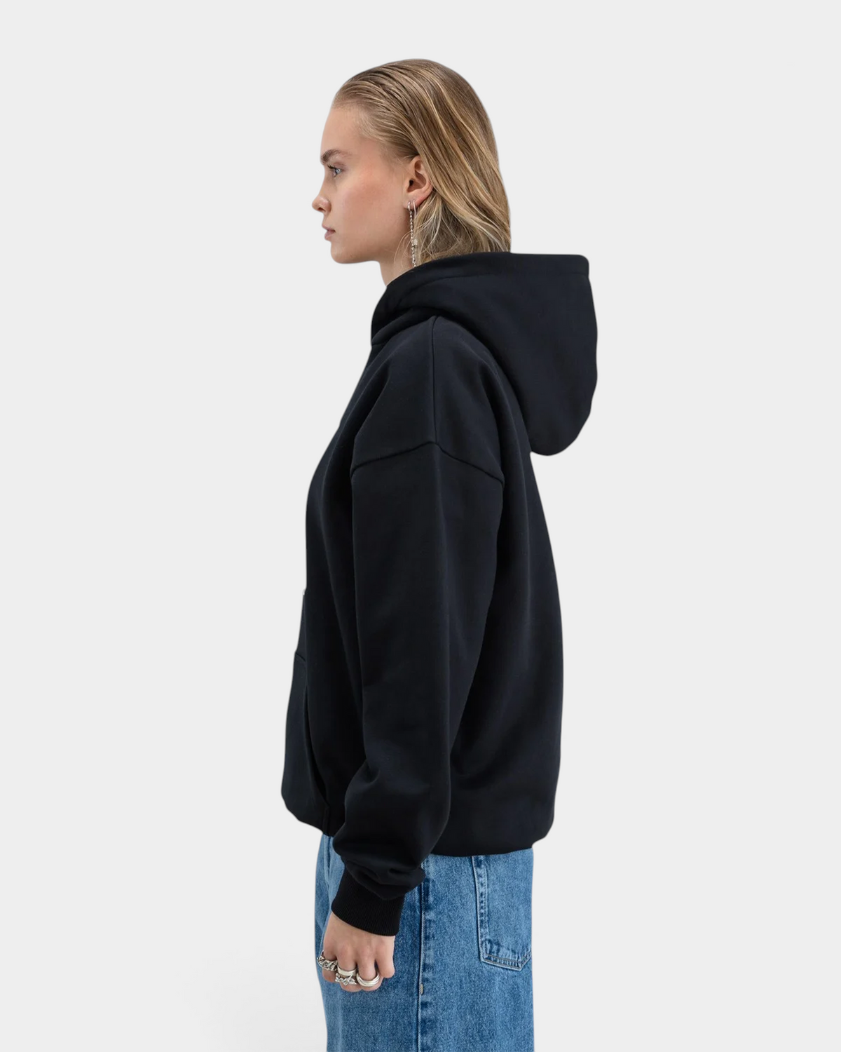 Lockwood Avenue Beyond Medals Ohlympic black heavyweight cotton hoodie worn by a model in a side profile view