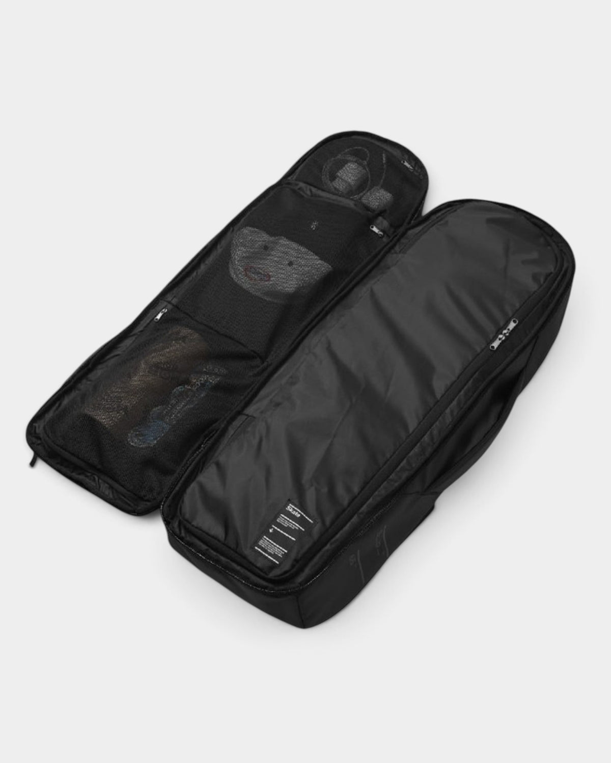 Lockwood Avenue DB Journey 65L black split duffel bag with mesh interior compartments for travel and skate gear