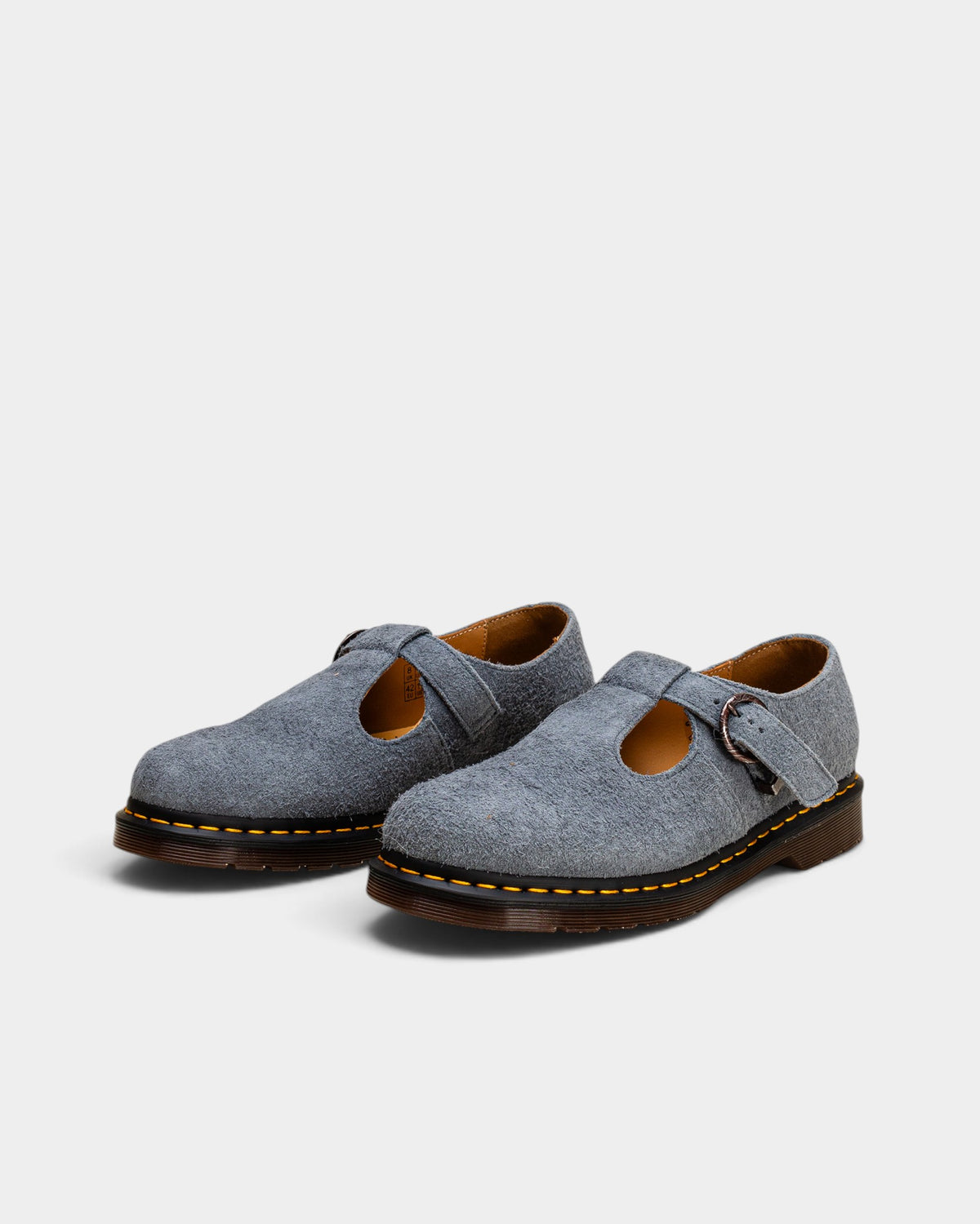 Lockwood Avenue Dr. Martens blue long napped suede T-bar Mary Jane shoes with signature yellow welt stitching.