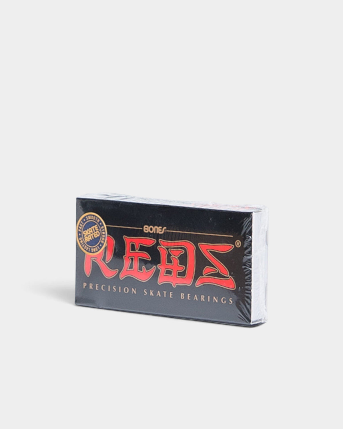 Lockwood Avenue Bones Reds precision skateboard bearings in black and red retail packaging