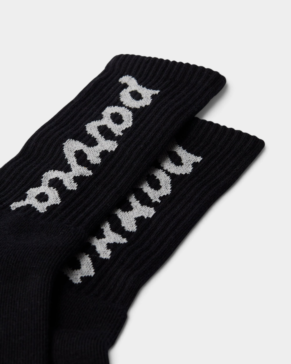 Lockwood Avenue by Parra black crew socks with white woven lowercase script logo detail