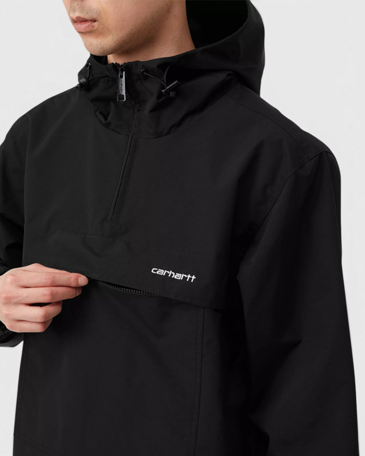 Lockwood Avenue Carhartt black water-repellent nylon windbreaker pullover with adjustable hood and chest logo