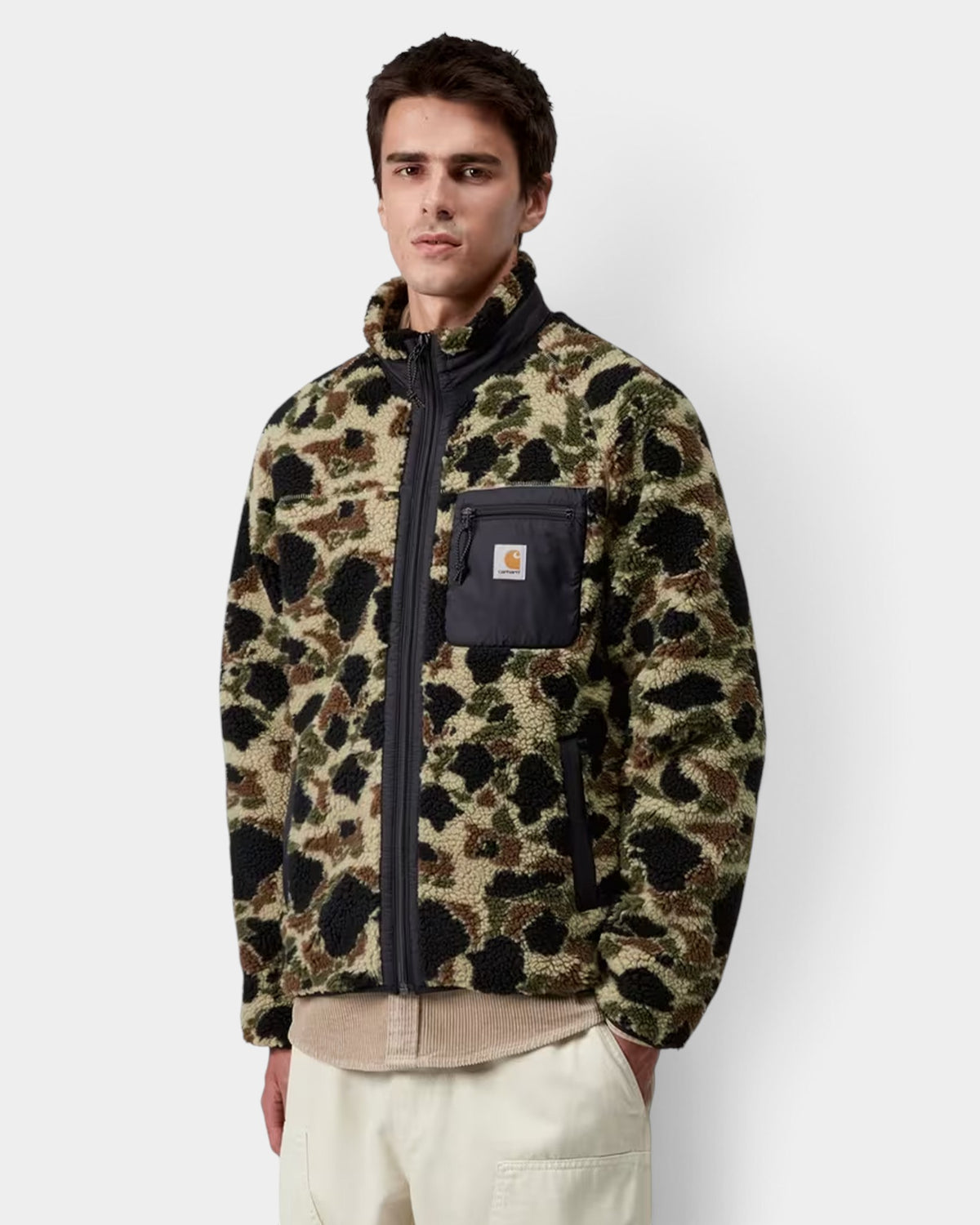 Lockwood Avenue Carhartt Prentis Liner jacket in camouflage polyester pile with a black nylon chest pocket and zip.