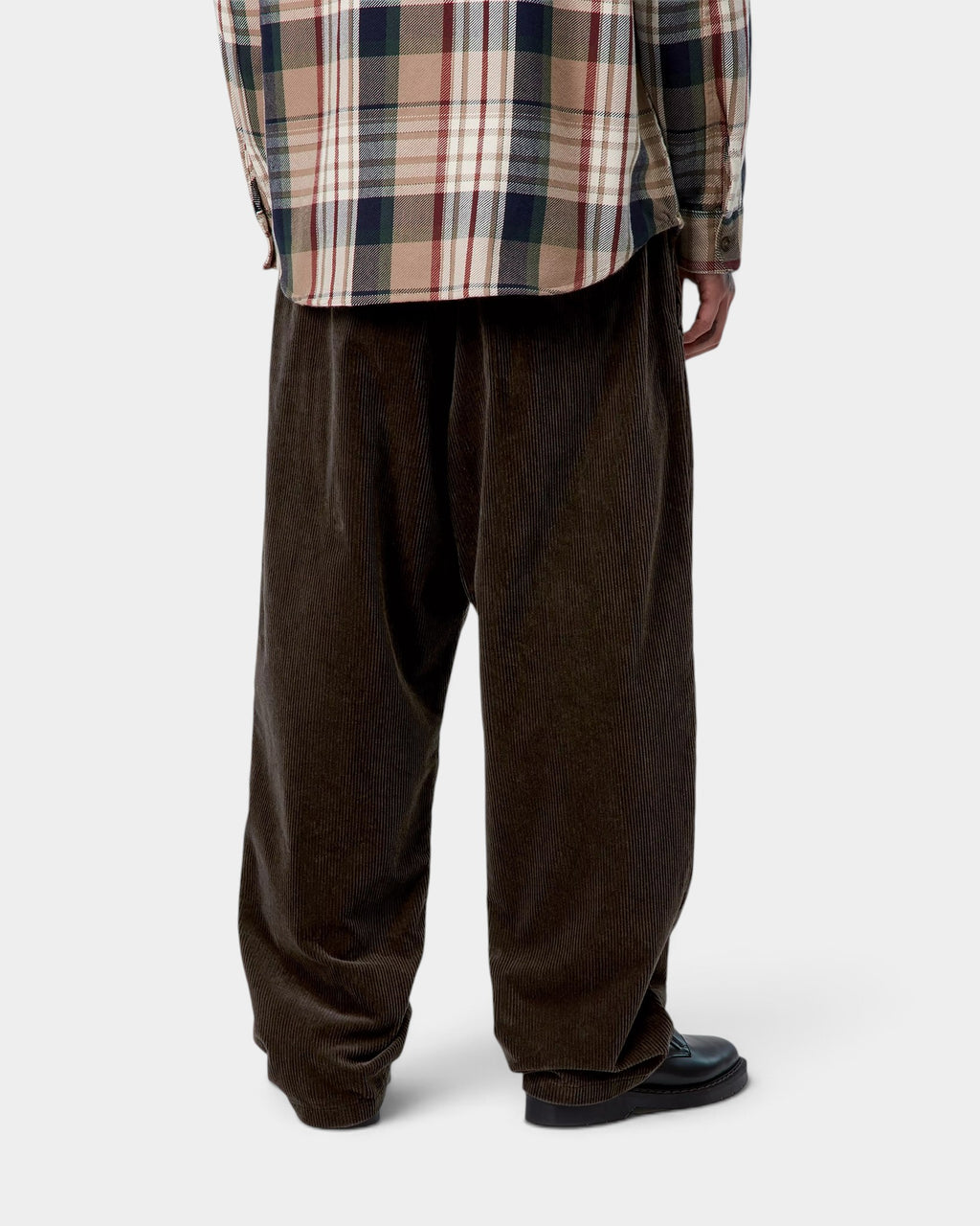 Lockwood Avenue Carhartt Evan brown corduroy trousers in a loose tapered fit with double pleats, back view.