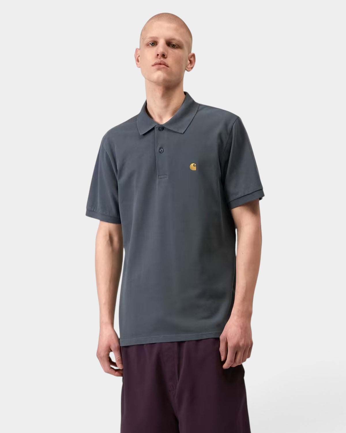 Lockwood Avenue Carhartt Chase Pique Polo in dark grey cotton with a two-button placket and gold chest logo.