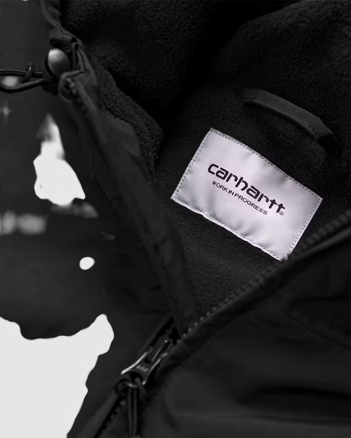 Lockwood Avenue Carhartt Hooded Sail Jacket featuring black nylon Supplex fabric and warm fleece lining