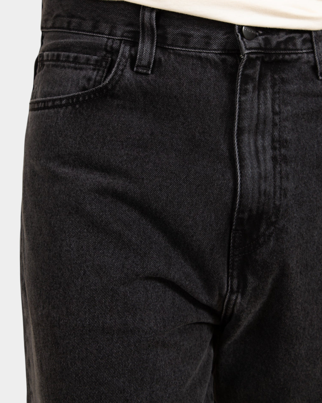 Lockwood Avenue Carhartt Landon stone-washed black denim pants with a loose tapered fit and five-pocket design.