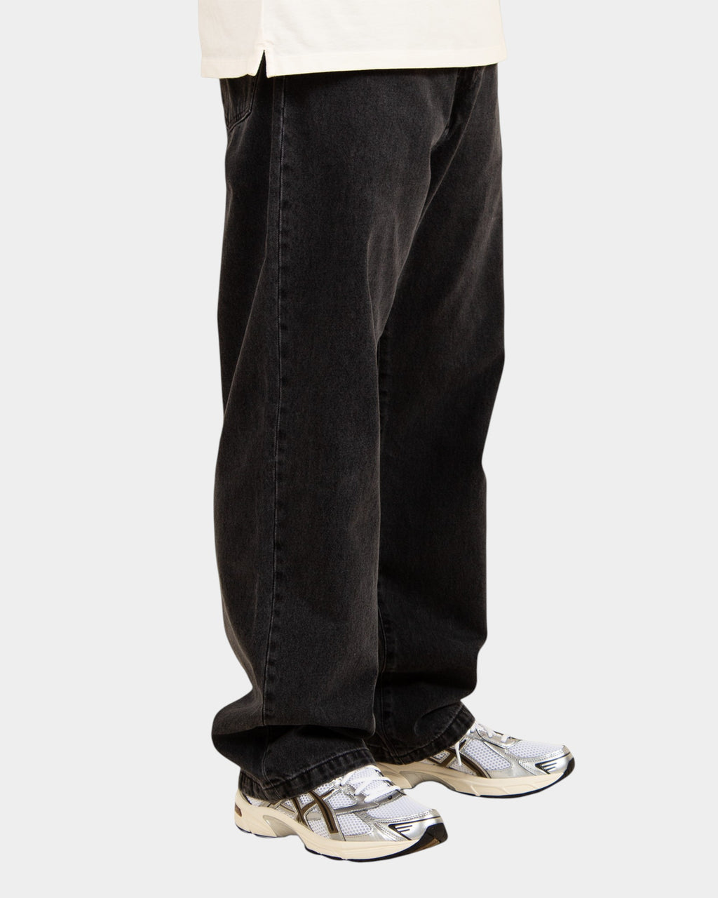 Lockwood Avenue Carhartt Landon loose tapered black stone-washed cotton denim jeans worn by a model