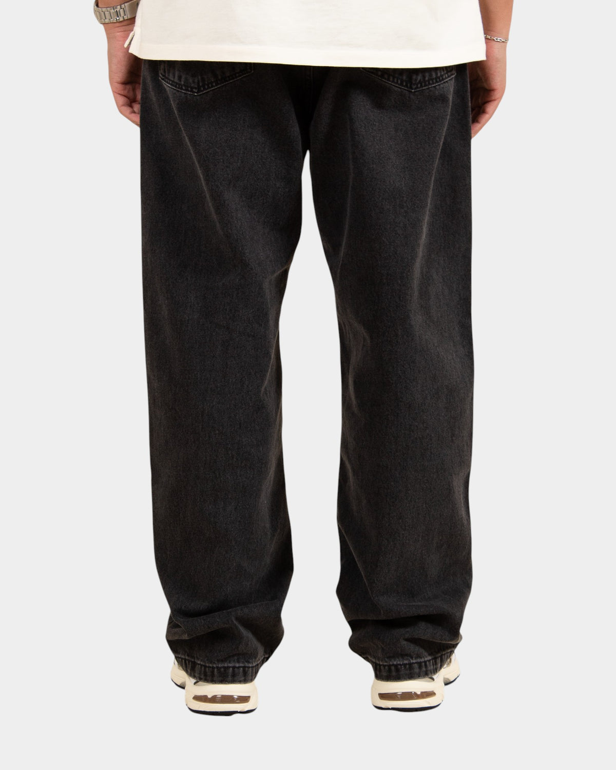 Lockwood Avenue Carhartt Landon loose tapered black stone-washed denim jeans viewed from the back