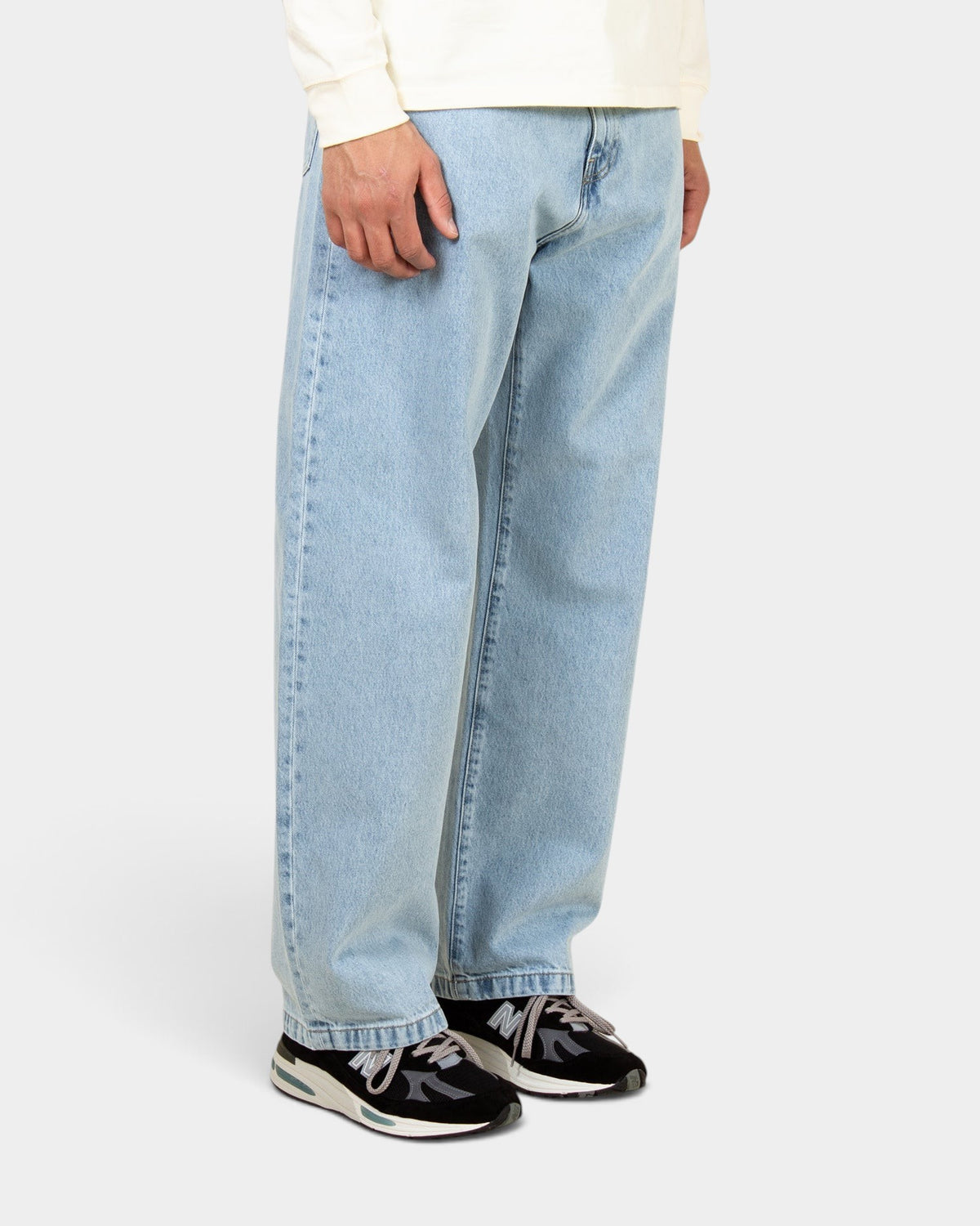 Lockwood Avenue Carhartt Landon pants in bleached light blue denim with a loose tapered fit worn by a model