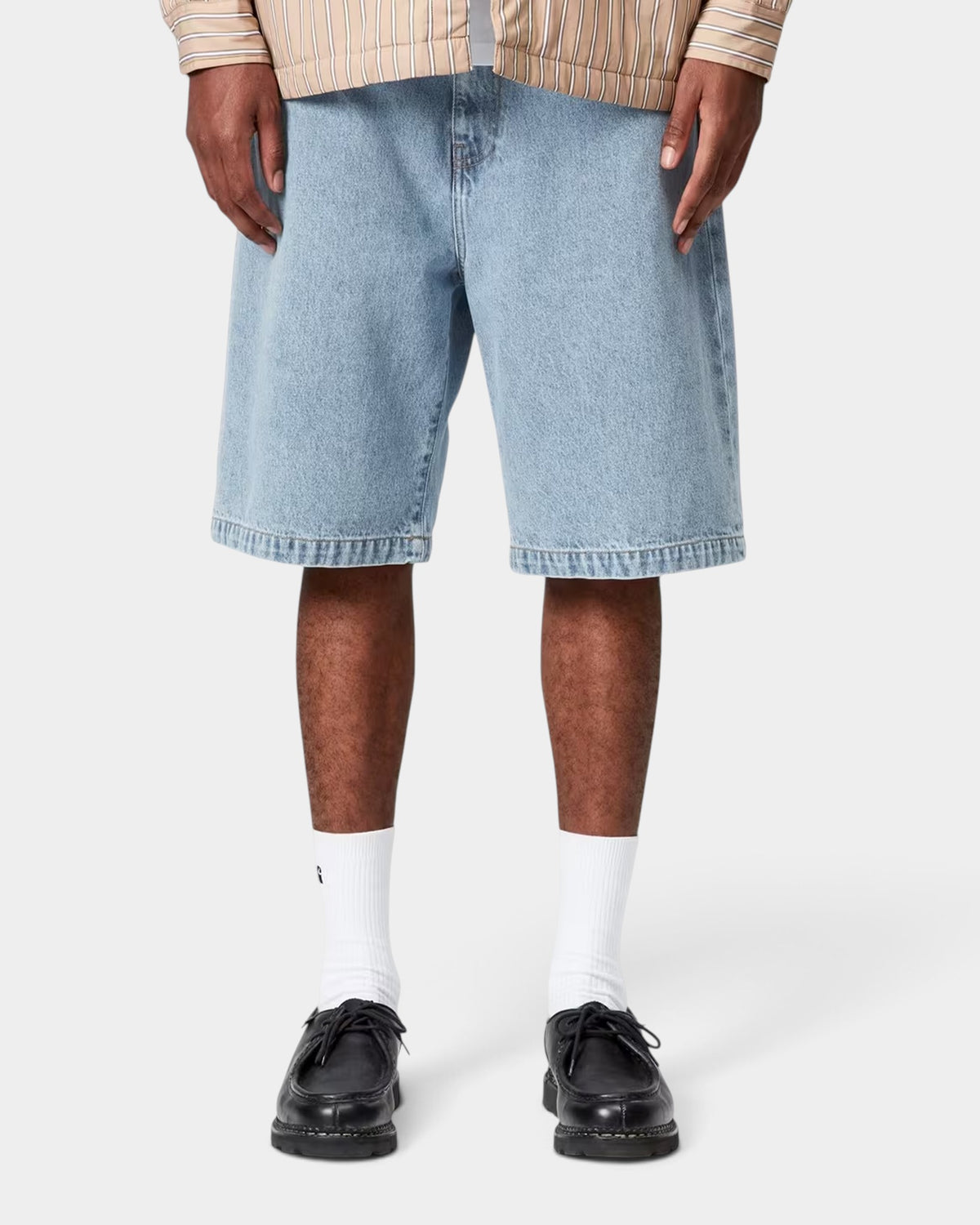 Lockwood Avenue Carhartt Landon loose fit bleached light blue denim shorts with five-pocket design on a model