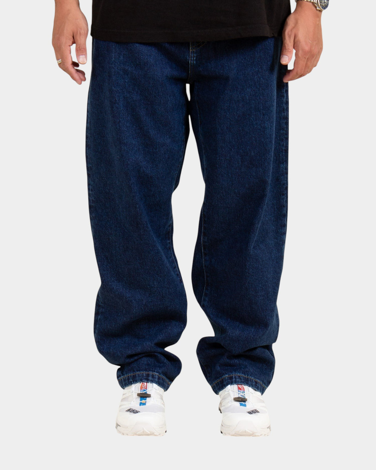 Lockwood Avenue Carhartt Landon loose tapered dark blue denim pants with a mid-rise fit and stone-washed finish.