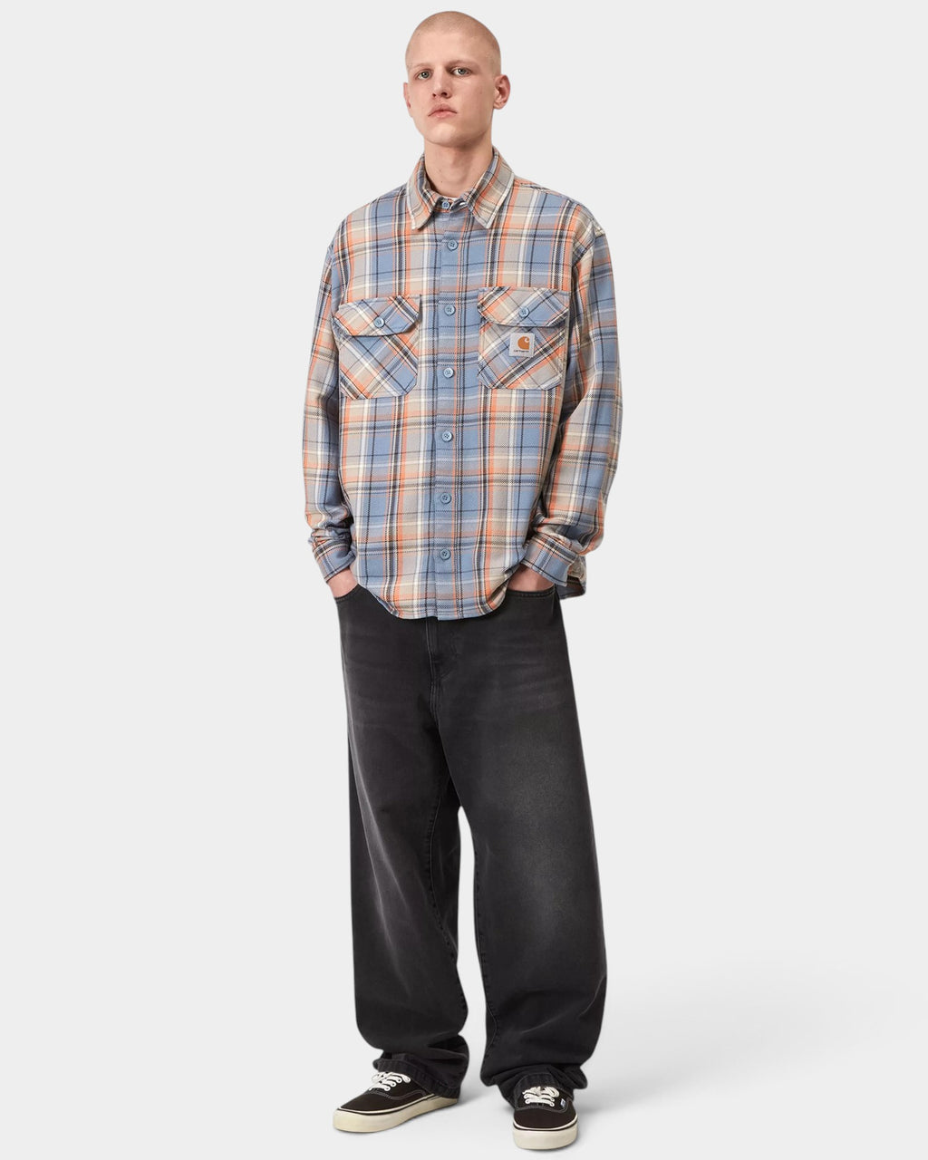 Lockwood Avenue Carhartt Landon pants in faded black bleached denim with a loose tapered fit on a male model